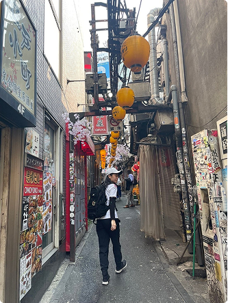 Tour guide walking down street in Tokyo